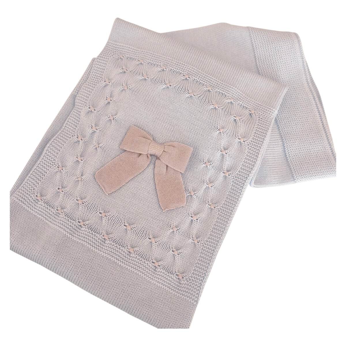 Coperta culla in pura lana con smock e fiocco